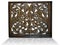 Floral vintage pattern carved in brown wood isolated over white