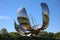 Floralis Generica in Buenos Aires. Its a metal Sculpture in the United Nations Park, which opens and closes its petal based on sol