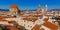 Florence Cathedral, Giotto`s Bell Tower, and San Lorenzo Basilica under blue sky, over houses of the historical center of Florenc