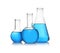 Florence and conical flasks with blue liquid on background. Laboratory glassware