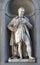 FLORENCE, ITALY, January 6, 2020: Statue of Michelangelo situated along the colonnade of the Uffizi Gallery in Florence