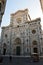Florence, Italy - March 16, 2017: Tourists visiting the Basilica di Santa Maria del Fiore with Giotto campanile tower bell