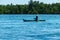 Flores/Indonesia 20290808: A fisherman`s boat crossing a calm sea near Maumere, Indonesia There is one man in the boat, wearing