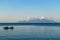 Flores/Indonesia 20290808: A fishermen`s boat crossing a calm sea near Maumere, Indonesia There are three men in one small, blue