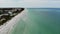 Florida clear blue water birds eye view, sandy beaches drone. city Ã¢â‚¬â€¹Ã¢â‚¬â€¹on the beach Aerial view of Indian Rocks Beach