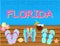 Florida lettering Vector tropical letters, with beach icons on blue water backround.