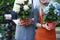 Florist Blogger Showing Hydrangea Flower on Camera