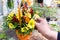 Florist collects floral bouquet. Work in a flower shop. Small business floristry