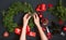 Florist hands making Christmas wreath