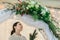 Florist make winter wedding floral arch composition indoors