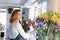 Florist owner making a new floral arrangements