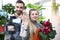 Florist Vlogger Holding Blooming Hydrangea in Pot