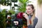 Florist Vlogger Touching Red Hydrangea Flower