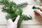 Florist at work: How to make fir garland using jute string and wire