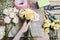 Florist at work. Woman making wedding bouquet