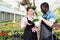 Florists discussing flowers seedlings