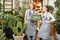 Florists with sign Open open flower shop