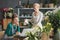 Florists working in flower shop