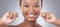 Flossing is so effective, it might change your taste. Studio shot of an attractive young woman flossing her teeth