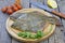 Flounder raw fish on cutting board