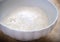 Flour with cornstarch in white ceramic bowl