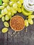 Flour grape seed in bowl on black board top