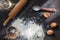 Flour and ingridients on black table