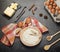 Flour in plate, eggs and butter, spices, on work surface