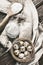 Flour and quail eggs on a rustic wooden table. Top view