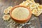 Flour sesame in clay bowl with cookies on board