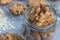 Flourless gluten free peanut butter, oatmeal and chocolate chips cookies in glass jar and on table, horizontal