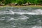 Flow Mountain River In Rocky Shores Landscape