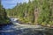 The flow of Yattumutka river and the waterfall at Jyrava view point in Oulanka National Park. Pieni Karhunkierros Trail in Finland