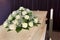 Flower arrangement on coffin