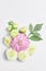 Flower arrangement. large Dahlia flowers on a light background. wedding layout, space for text, top view