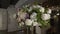 Flower arrangement at party. Decorated with white and pink flowers at wedding.