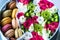 Flower box with flowers and macarons composition closeup