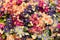 Flower fabric and Plastic colourful flowers. Background texture.
