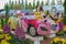 Flower festival, car made of flowers with animated model