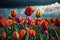 Flower garden with tulips in stormy rainy weather. Close-up. Realistic illustration