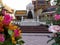 Flower offerings in front of the Monument of King Chulalongkorn Rama V. Wat Ratchabophit temple. Bangkok, Thailand