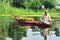 Flower seller on a shikara in Srinagar, Kashmir, India