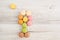 Flower and sun made of colorful macarons.