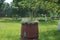 Flower vase in the form of old wooden barrels