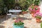 Flowered terrace with garden furniture