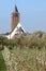 Flowering cherry trees and reformed dutch church