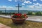 Flowers adorn the view across the top of the Mount Ingino above Gubbio, Italy