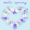 Flowers anemone and hepatica in the shape of a heart with the words Hello spring