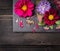 Flowers Arrangement with dahlias on dark table , background