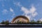 Flowers on the balcony and sky, tower, clouds, above